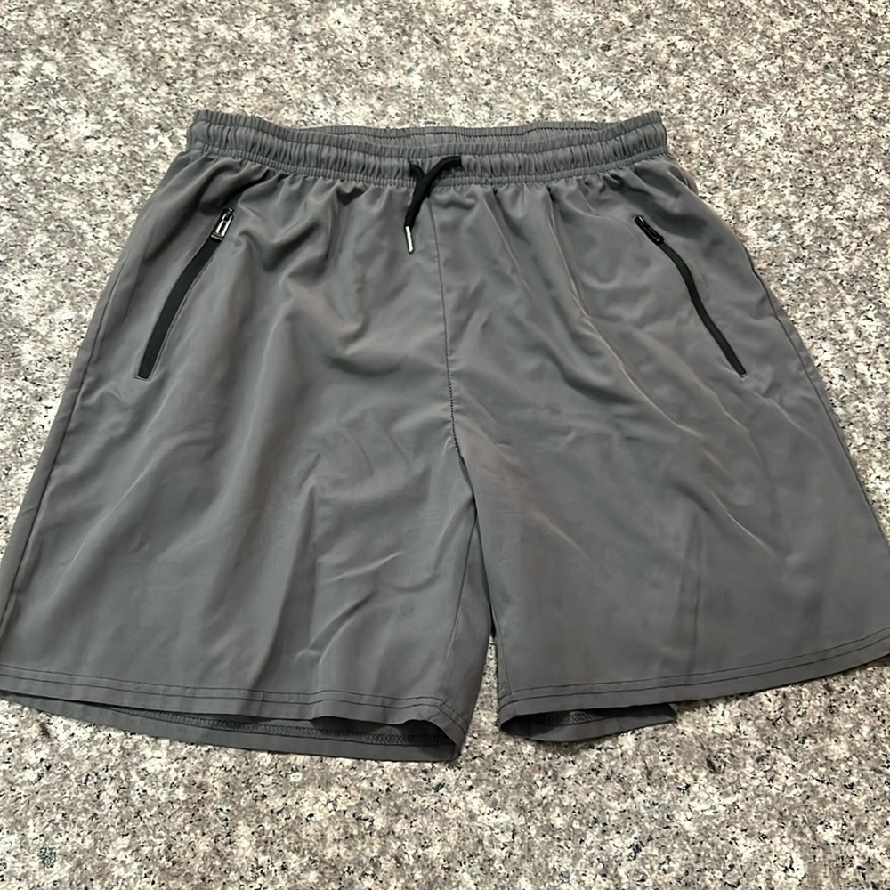 Men’s performance shorts.  Light weight quick dry. Excellent condition